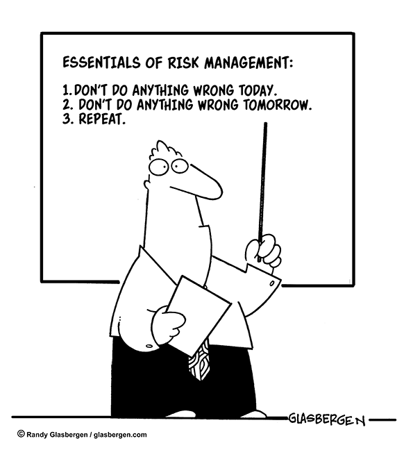 Teacher pointing at the writing on a whiteboard, which reads: “Essentials of Risk Management: 1. Don’t do anything wrong today. 2. Don’t do anything wrong tomorrow. 3. Repeat.”